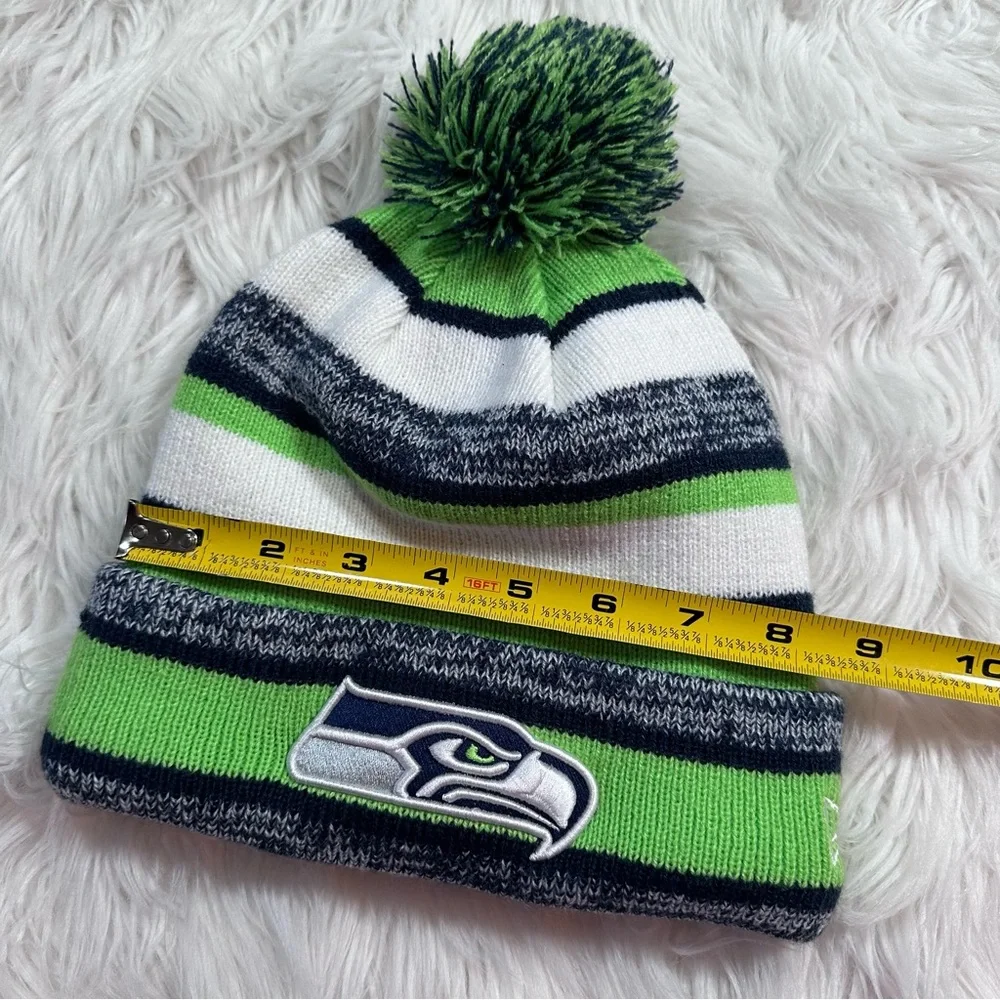 New Era • Official NFL Seattle Seahawks Striped Pom Pom Beanie - Picture 3 of 8